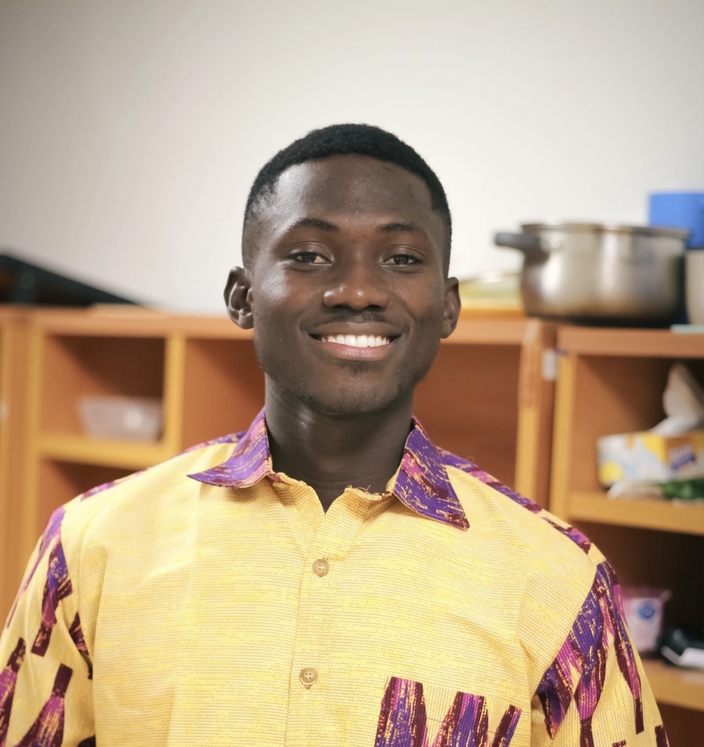 Isaac. This Image is Informative. It gives context into the fact that Isaac, a member of the Afrikanets community, is a student from Africa in Moscow, Russia.